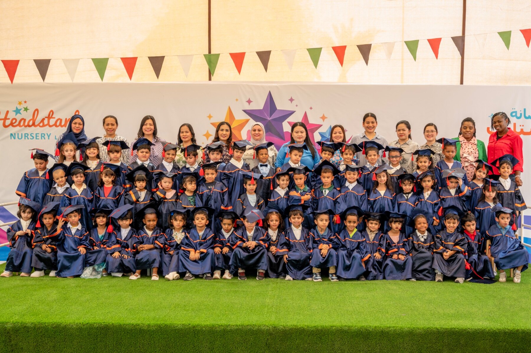 Children and staff of Headstart Nursery at their graduation celebration